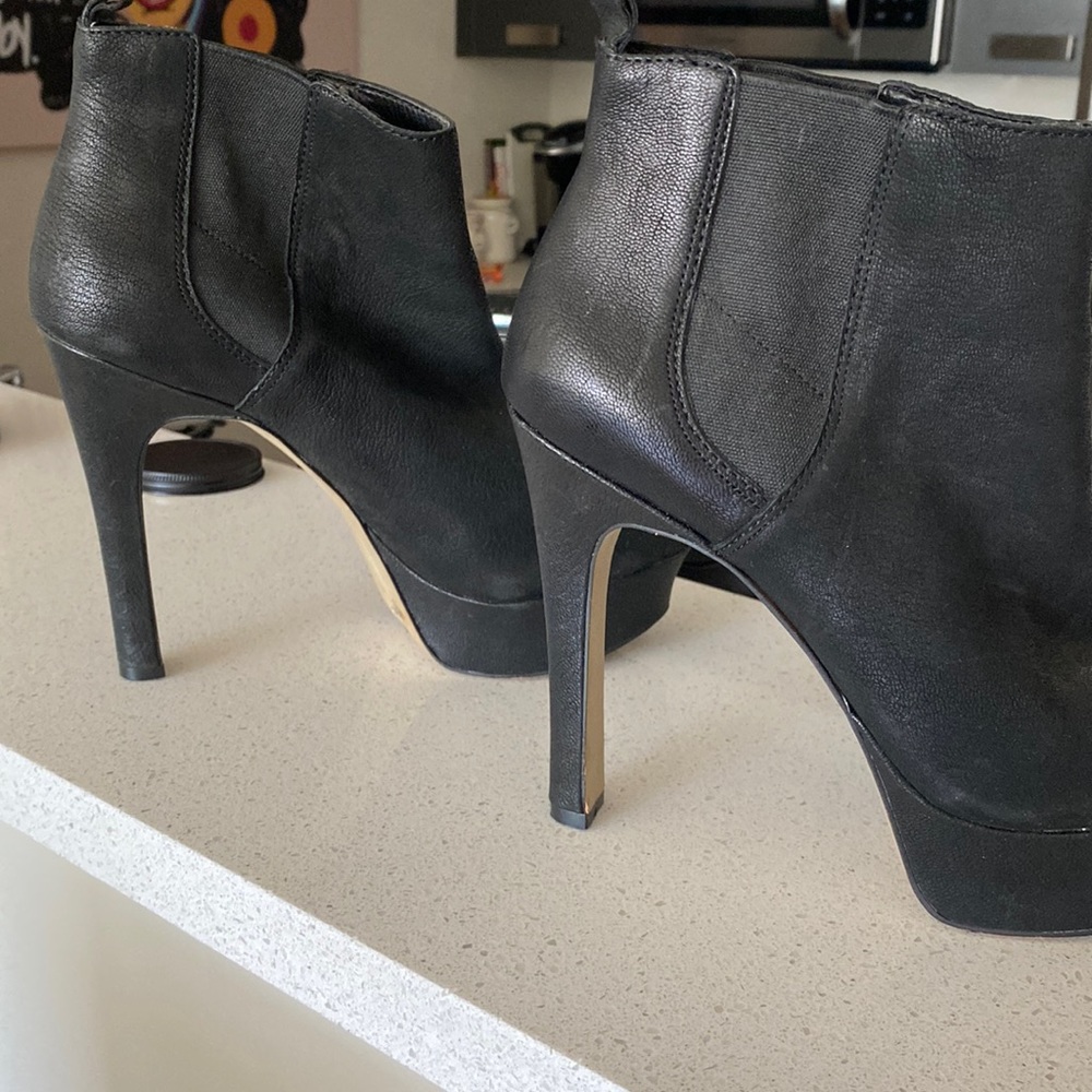 Black Platform heeled shoe bootie.